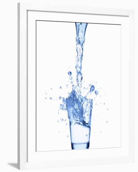 Pouring Water from a Bottle into a Glass-Kr?ger and Gross-Framed Photographic Print