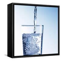 Pouring Water into a Glass-Kai Schwabe-Framed Stretched Canvas