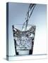 Pouring Water into a Glass-Bodo A^ Schieren-Stretched Canvas