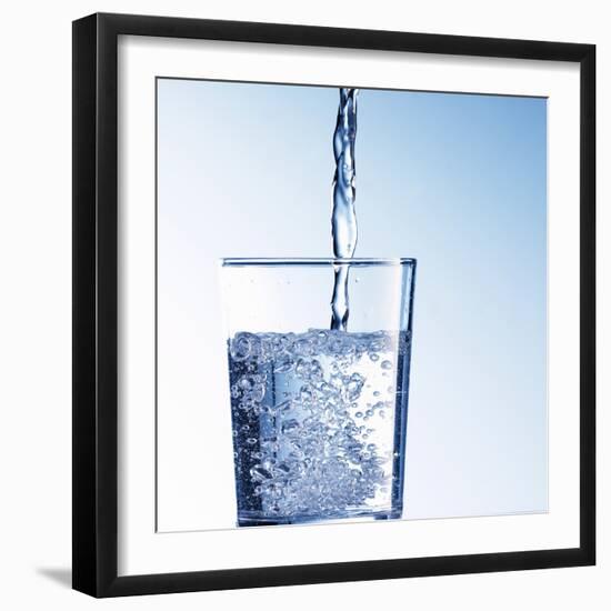 Pouring Water into a Glass-Kai Schwabe-Framed Photographic Print