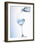 Pouring Water into a Glass-Klaus Arras-Framed Photographic Print