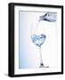 Pouring Water into a Glass-Klaus Arras-Framed Photographic Print