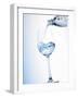 Pouring Water into a Glass-Klaus Arras-Framed Photographic Print