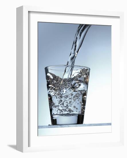 Pouring Water into a Glass-Bodo A^ Schieren-Framed Photographic Print