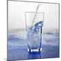 Pouring Water into Glass-Alexander Feig-Mounted Photographic Print