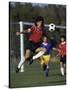 Powerful Leaping Soccer Player-null-Stretched Canvas