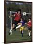 Powerful Leaping Soccer Player-null-Framed Photographic Print