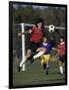 Powerful Leaping Soccer Player-null-Framed Photographic Print