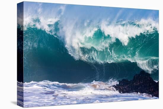 Powerful wave breaking off a beach, Hawaii-Mark A Johnson-Stretched Canvas