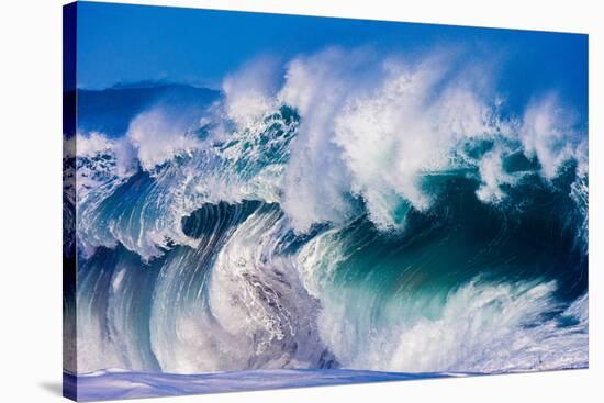 Powerful wave breaking off a beach, Hawaii-Mark A Johnson-Stretched Canvas