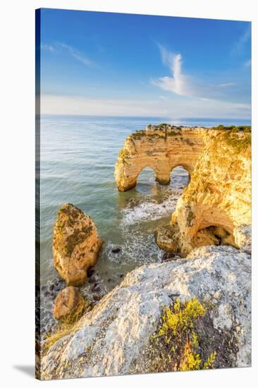 Praia de Marinha, Caramujeira, Lagoa, Algarve, Portugal. Coastal rock formations at sunrise.-Marco Bottigelli-Stretched Canvas