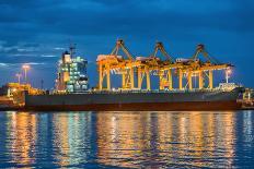 Container Cargo Freight Ship with Working Container Crane in Shipyard at Dusk-Prasit Rodphan-Photographic Print