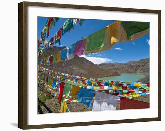 Prayer Flags Above An Artifical Lake Near the Karo-La Pass, Tibet, China, Asia-Michael Runkel-Framed Photographic Print