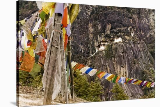 Prayer Flags Along Trail to Takshang Monastery (Tiger's Nest), Bhutan-Howie Garber-Stretched Canvas