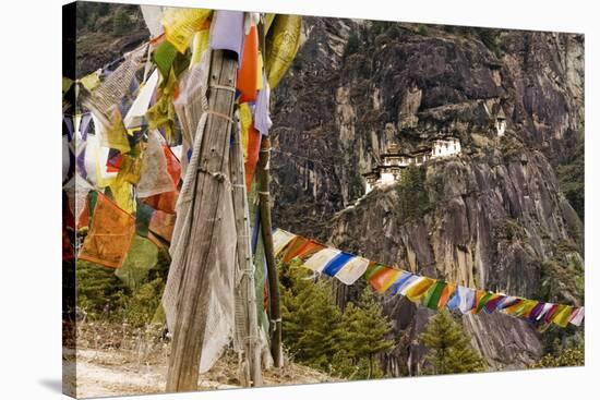Prayer Flags Along Trail to Takshang Monastery (Tiger's Nest), Bhutan-Howie Garber-Stretched Canvas