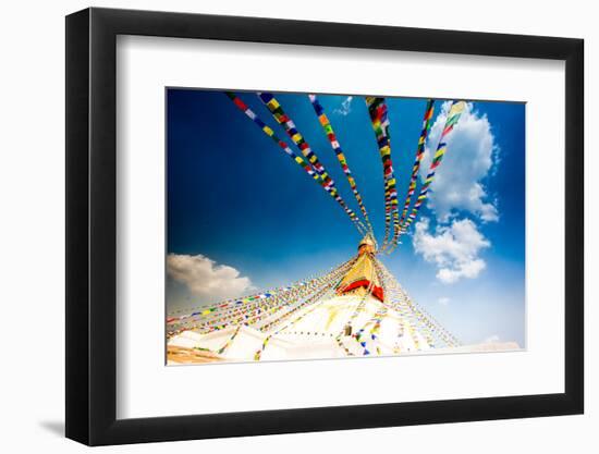 Prayer flags and Buddhist stupa at Bouddha (Boudhanath), UNESCO World Heritage Site, Kathmandu, Nep-Laura Grier-Framed Photographic Print