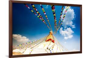 Prayer flags and Buddhist stupa at Bouddha (Boudhanath), UNESCO World Heritage Site, Kathmandu, Nep-Laura Grier-Framed Photographic Print