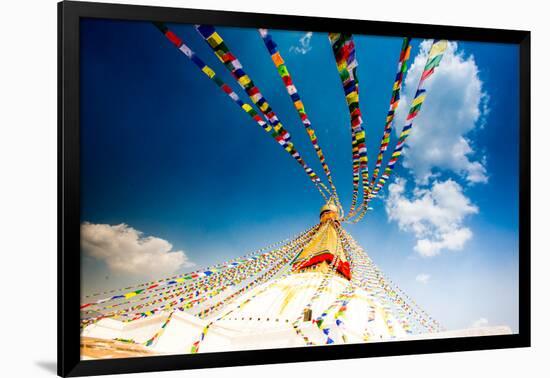 Prayer flags and Buddhist stupa at Bouddha (Boudhanath), UNESCO World Heritage Site, Kathmandu, Nep-Laura Grier-Framed Photographic Print