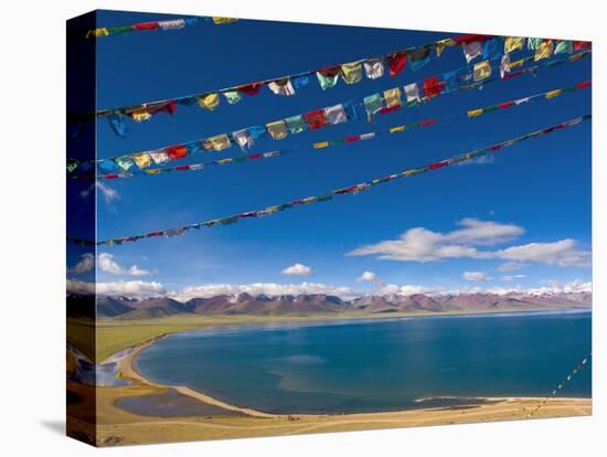 Prayer Flags at Nam Tso Lake, Central Tibet-Michele Falzone-Stretched Canvas