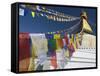 Prayer Flags Flutter from the Apex of Bodnath Stupa, Kathmandu, Nepal-Christopher Bettencourt-Framed Stretched Canvas
