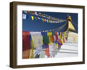 Prayer Flags Flutter from the Apex of Bodnath Stupa, Kathmandu, Nepal-Christopher Bettencourt-Framed Photographic Print