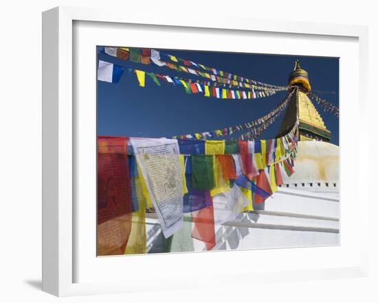 Prayer Flags Flutter from the Apex of Bodnath Stupa, Kathmandu, Nepal-Christopher Bettencourt-Framed Photographic Print