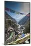 Prayer flags from bridge with Mt. Ama Dablam in background.-Lee Klopfer-Mounted Photographic Print