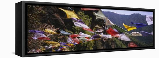 Prayer Flags in Front of a Monastery on a Mountain, Taktshang, Paro Valley, Bhutan-null-Framed Stretched Canvas