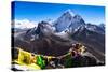 Prayer flags in Himalayas, Nepal with Ama Dablam mountain from high elevation with snow and lake-David Chang-Stretched Canvas