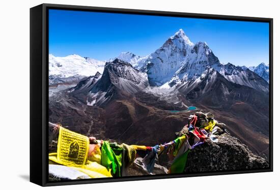 Prayer flags in Himalayas, Nepal with Ama Dablam mountain from high elevation with snow and lake-David Chang-Framed Stretched Canvas