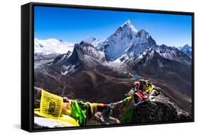 Prayer flags in Himalayas, Nepal with Ama Dablam mountain from high elevation with snow and lake-David Chang-Framed Stretched Canvas