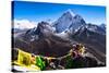 Prayer flags in Himalayas, Nepal with Ama Dablam mountain from high elevation with snow and lake-David Chang-Stretched Canvas