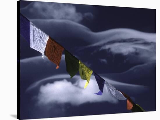 Prayer Flags Infront of Clouds, Nepal-Michael Brown-Stretched Canvas