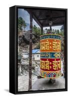 Prayer wheel along a trail, Phakding, Nepal.-Lee Klopfer-Framed Stretched Canvas