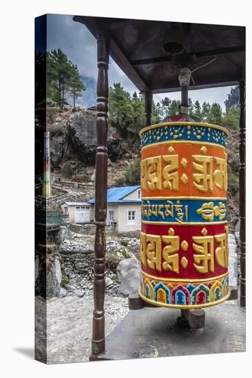 Prayer wheel along a trail, Phakding, Nepal.-Lee Klopfer-Stretched Canvas