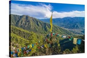 Praying Flags before the Tiger's Nest, Taktsang Goempa Monastery Hanging in the Cliffs, Bhutan-Michael Runkel-Stretched Canvas