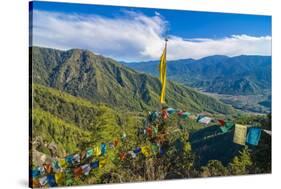 Praying Flags before the Tiger's Nest, Taktsang Goempa Monastery Hanging in the Cliffs, Bhutan-Michael Runkel-Stretched Canvas