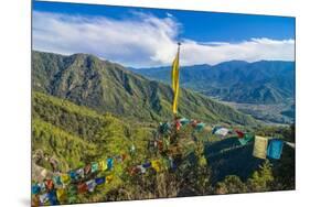 Praying Flags before the Tiger's Nest, Taktsang Goempa Monastery Hanging in the Cliffs, Bhutan-Michael Runkel-Mounted Photographic Print