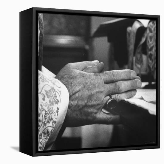 Praying Hands of Monk Churchman Resting on Table During Mass at St. Benedict's Abbey-Gordon Parks-Framed Stretched Canvas