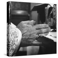 Praying Hands of Monk Churchman Resting on Table During Mass at St. Benedict's Abbey-Gordon Parks-Stretched Canvas