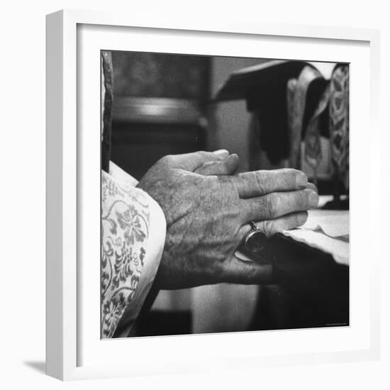 Praying Hands of Monk Churchman Resting on Table During Mass at St. Benedict's Abbey-Gordon Parks-Framed Photographic Print