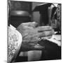 Praying Hands of Monk Churchman Resting on Table During Mass at St. Benedict's Abbey-Gordon Parks-Mounted Photographic Print