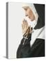 Praying Nun Holding Rosary-null-Stretched Canvas