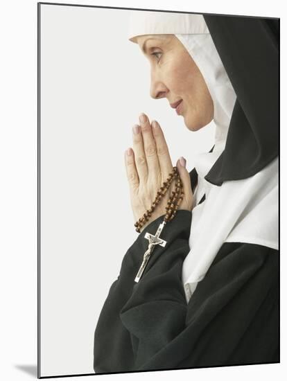 Praying Nun Holding Rosary-null-Mounted Photographic Print