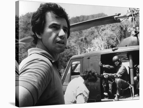 PREDATOR, 1987 directed by JOHN McTIERNAN On the set, the director, John McTiernan (b/w photo)-null-Stretched Canvas