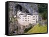 Predjama, Inner Carniola, Slovenia. Predjama Castle, built into the opening of a cave.-null-Framed Stretched Canvas