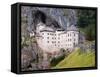 Predjama, Inner Carniola, Slovenia. Predjama Castle, built into the opening of a cave.-null-Framed Stretched Canvas