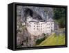 Predjama, Inner Carniola, Slovenia. Predjama Castle, built into the opening of a cave.-null-Framed Stretched Canvas