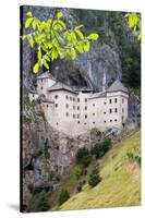 Predjama, Inner Carniola, Slovenia. Predjama Castle, built into the opening of a cave.-null-Stretched Canvas