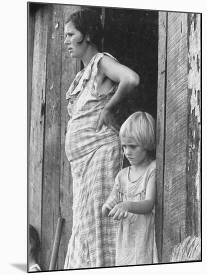 Pregnant Sharecropper's Wife Standing in Doorway of Wooden Shack with Daughter, the Depression-Arthur Rothstein-Mounted Photographic Print